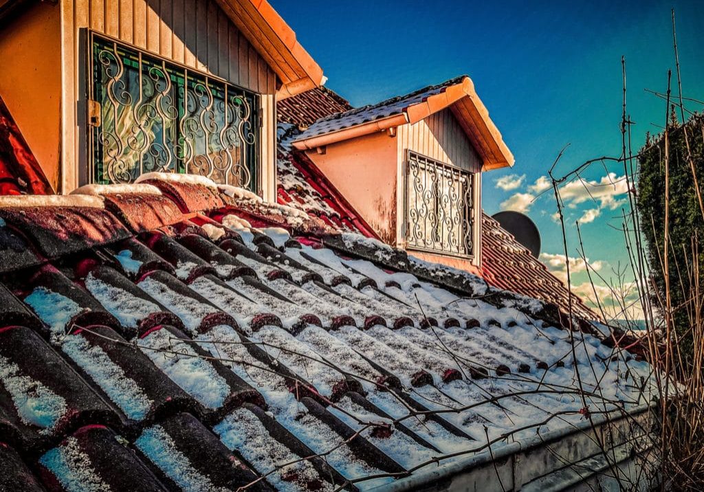 low-angle-view-old-building-against-blue-sky