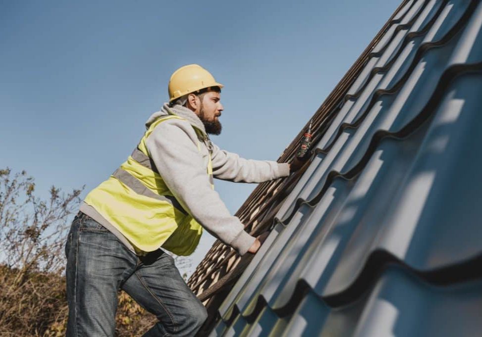 side-view-man-working-roof